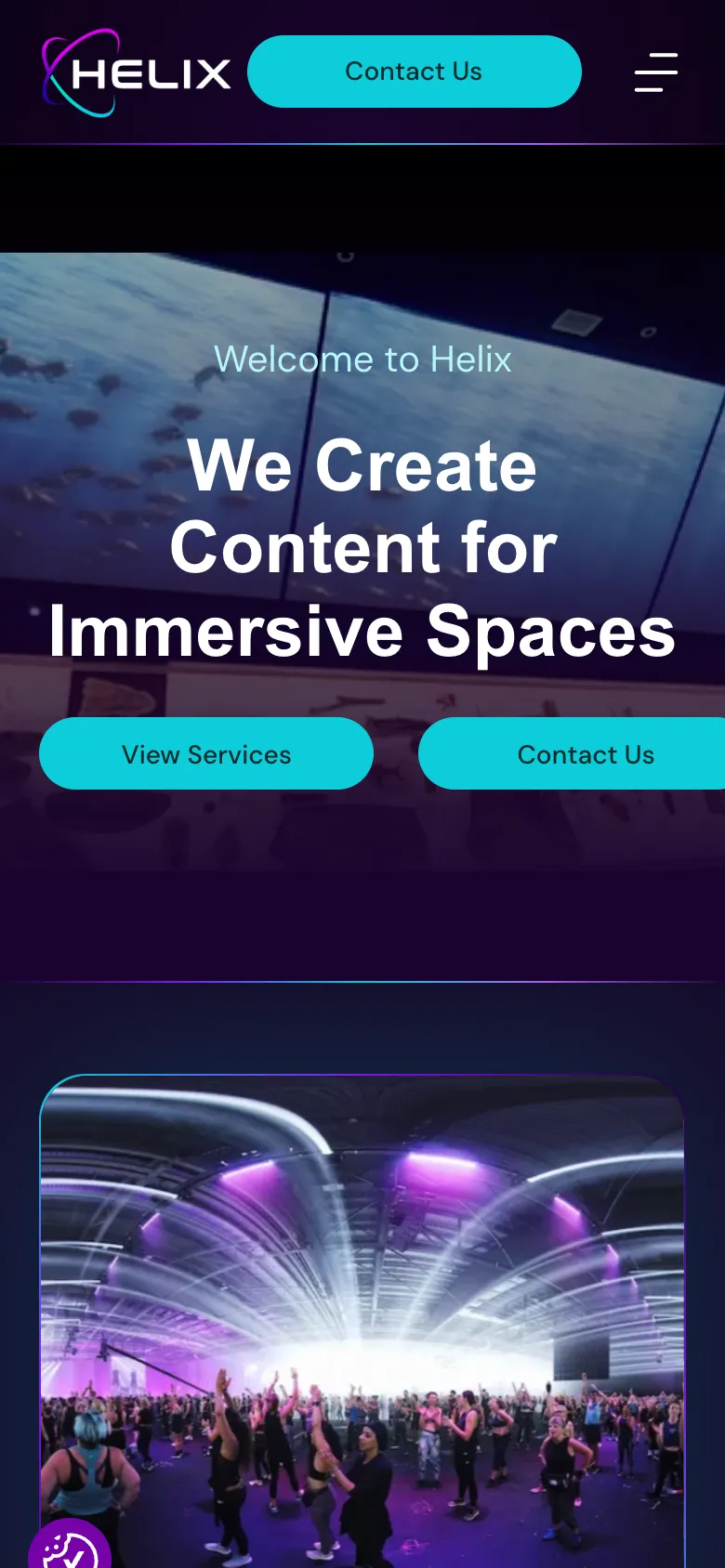 Helix website on a phone, with the Helix logo, a Contact Us button and the headline We Create Content for Immersive Spaces over a video
