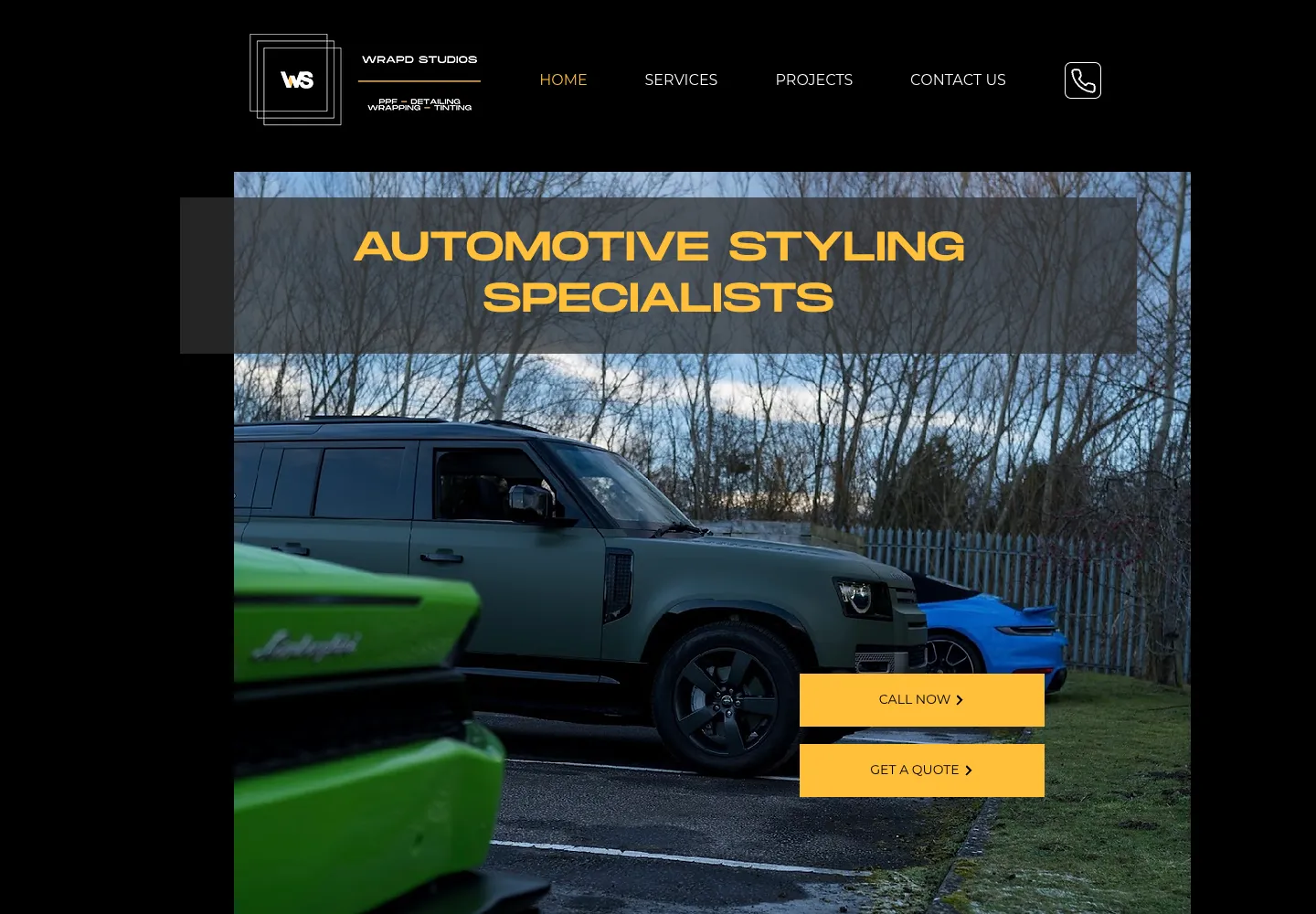 Wrapd Studios’ previous homepage, a large car photo with call and quote buttons and no form
